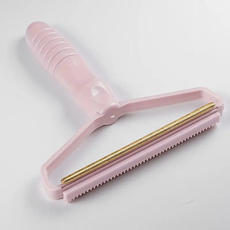 Cepillo para quitar el pelo, raspador portátil.