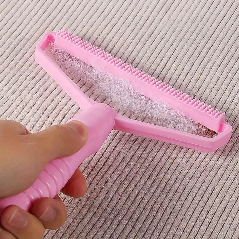 Cepillo para quitar el pelo, raspador portátil.
