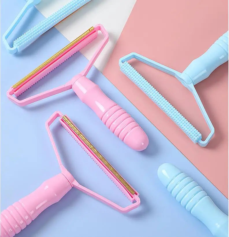 Cepillo para quitar el pelo, raspador portátil.